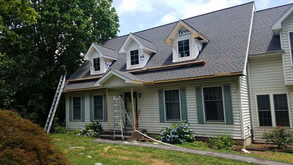 A Cape Cod in northern Lancaster County the day its new architectural shingle roof went on