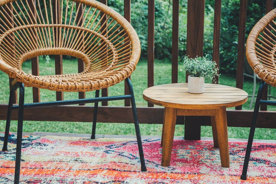 Composite deck with railing and outdoor chairs