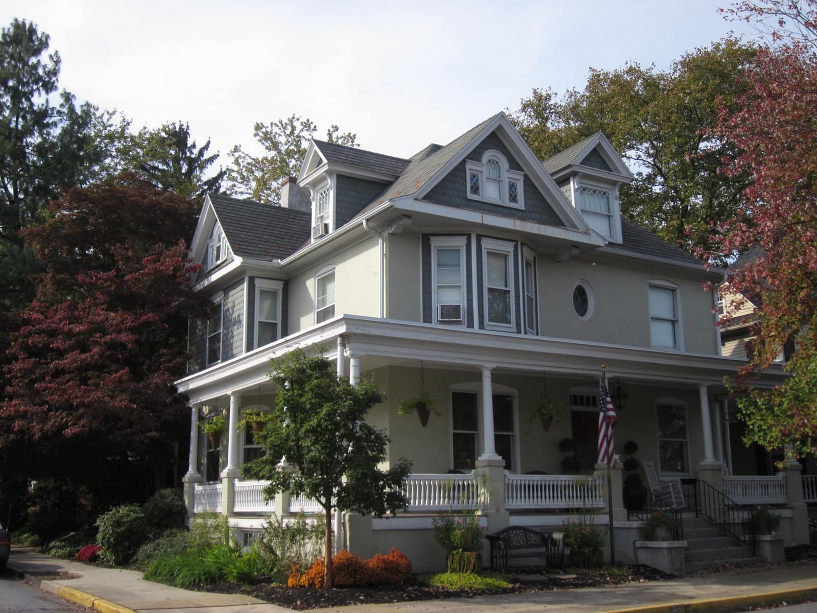 A Victorian home with a wraparound porch in Lititz, Pennsylvania
