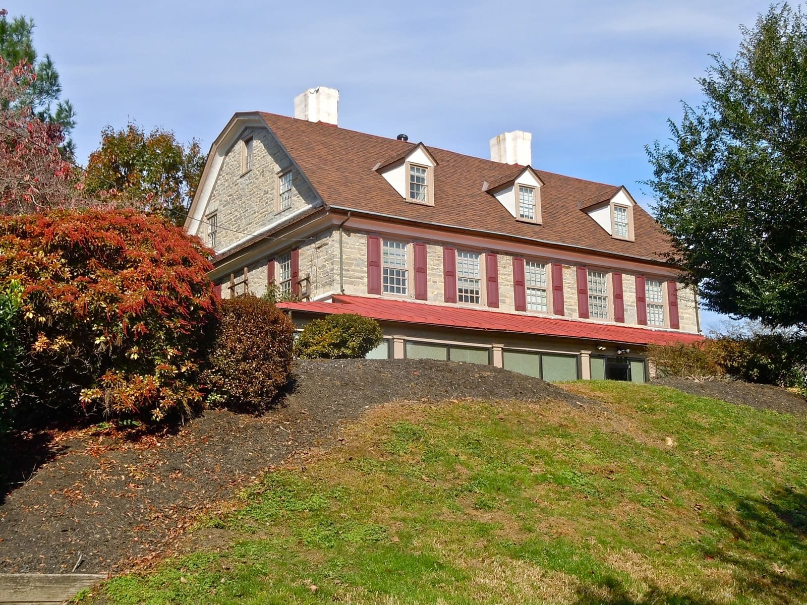 A stone house with a red roof in Mount Joy, Pennsylvania
